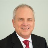 Staff member John Toler